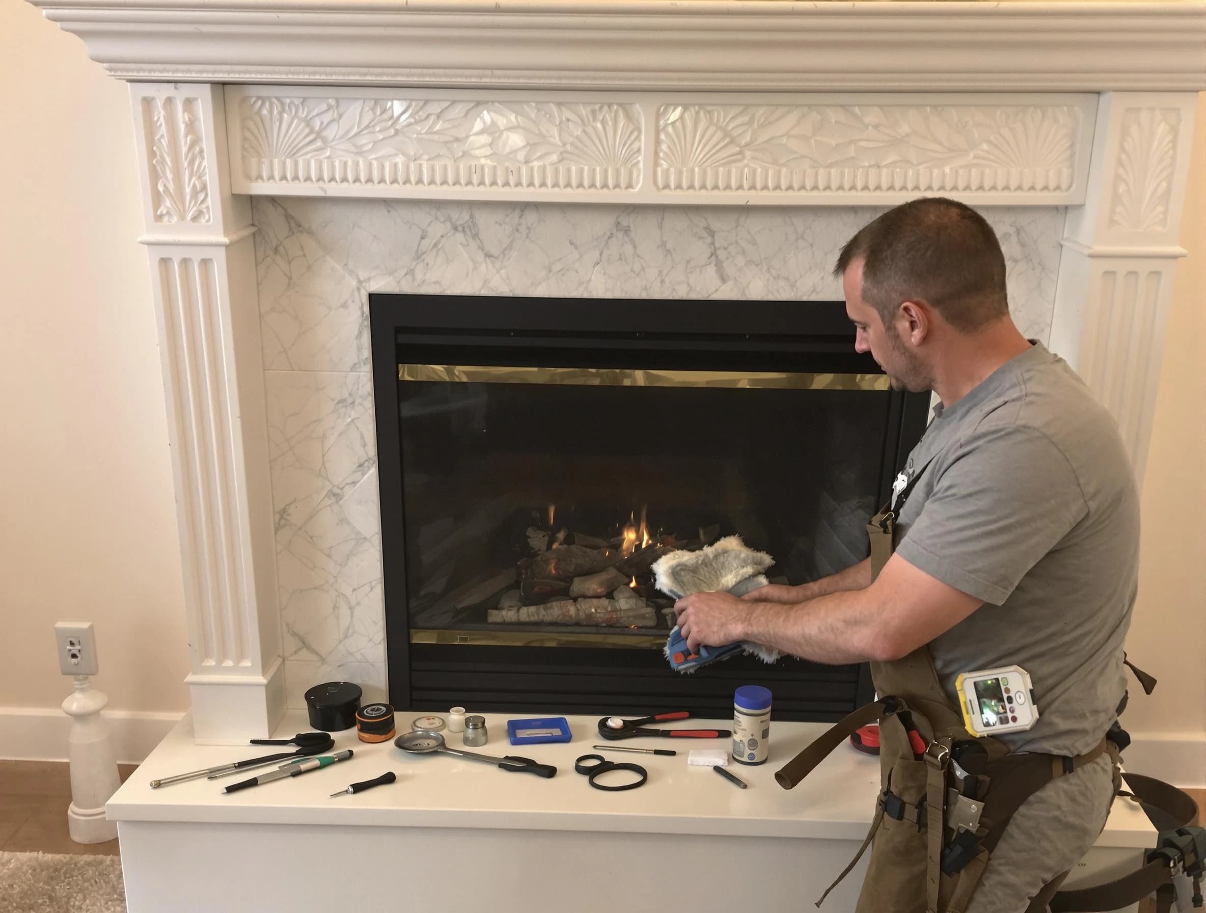 Conley Chimney Sweep performing fireplace maintenance in Conley, GA